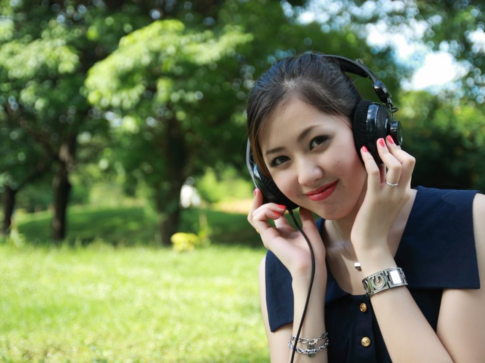Person smiling with headphones