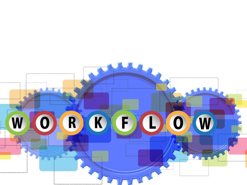 Workflow written on cog wheels