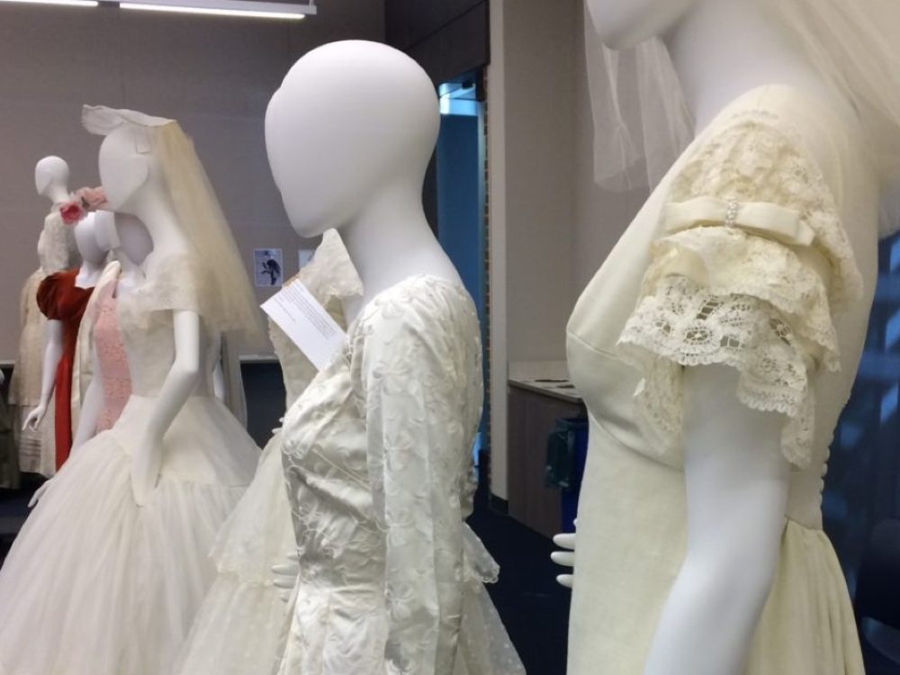 Wedding dresses on mannequins arranged in the Avenir Classroom for a class