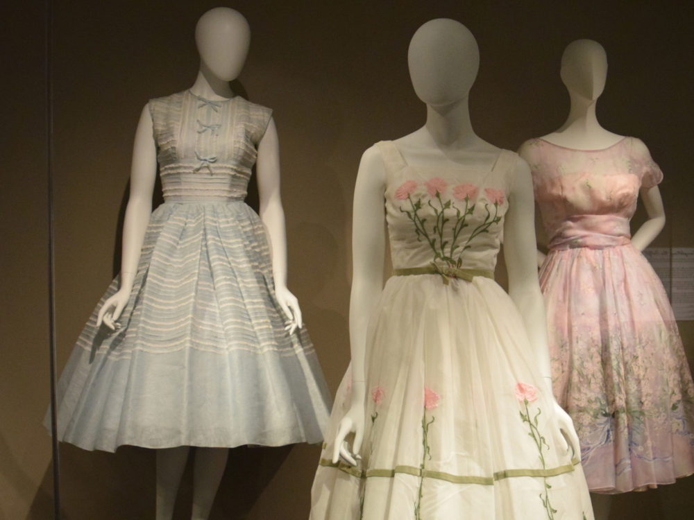 Dior Exhibit of 3 flowing dresses on mannequins in the Richard Blackwell Gallery