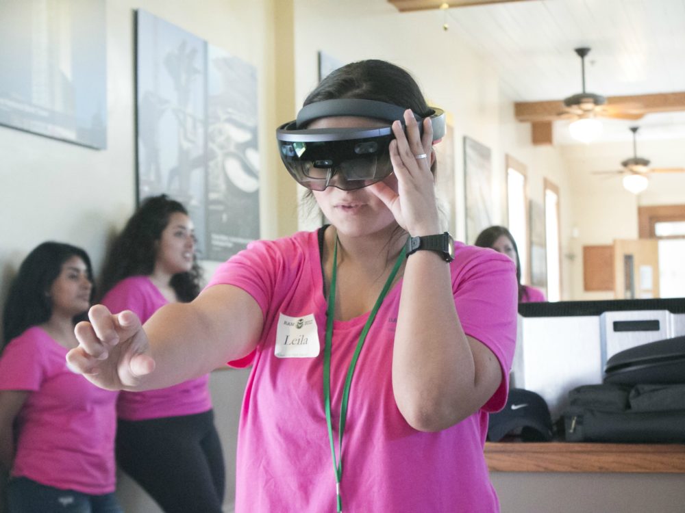 Camp participant wearing virtual reality glasses