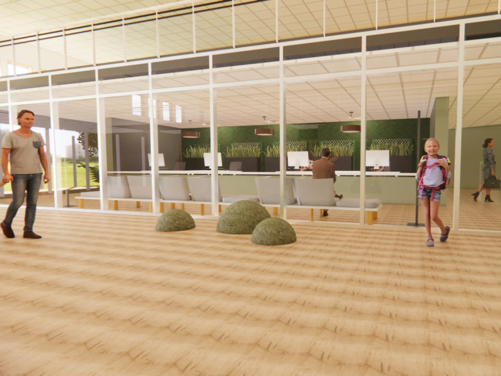 Learning center entry way with transparent walls and decorative rocks.