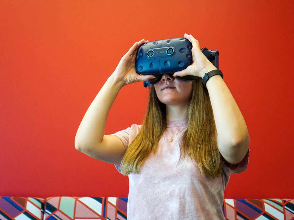 student using virtual reality glasses