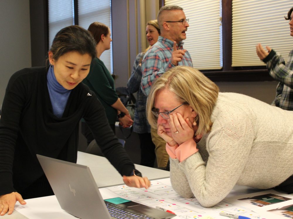 Dr. Kwon and Dean Youngblade look at design plans on the computer