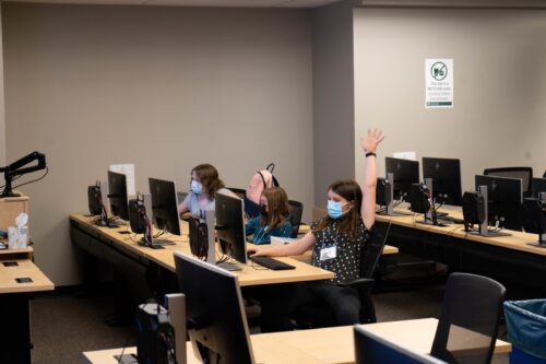 students work in the computer lab on textile designs