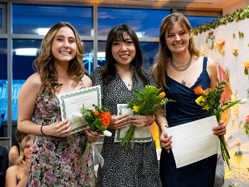three award winners at the fashion show all in bloom