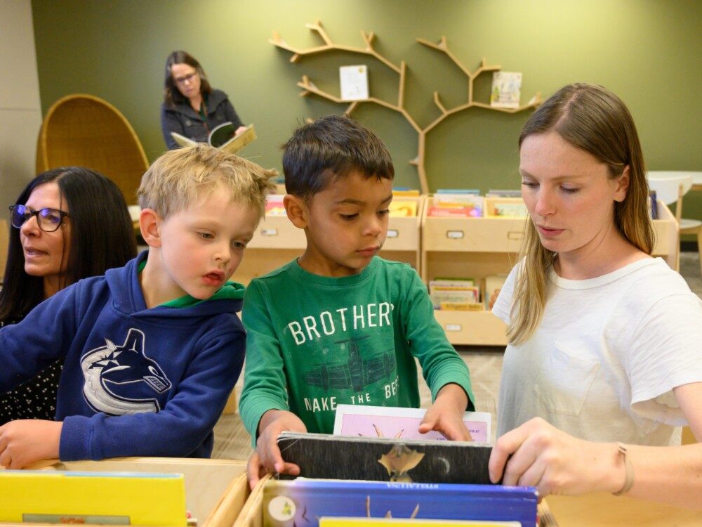 Students engage with a mentor as they use the newly re-designed space for the Early childhood education center