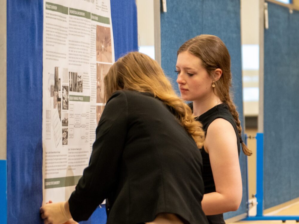 Members of Jain Kwon's SPACE Lab present their poster at the College of Health and Human Sciences Research Day event.