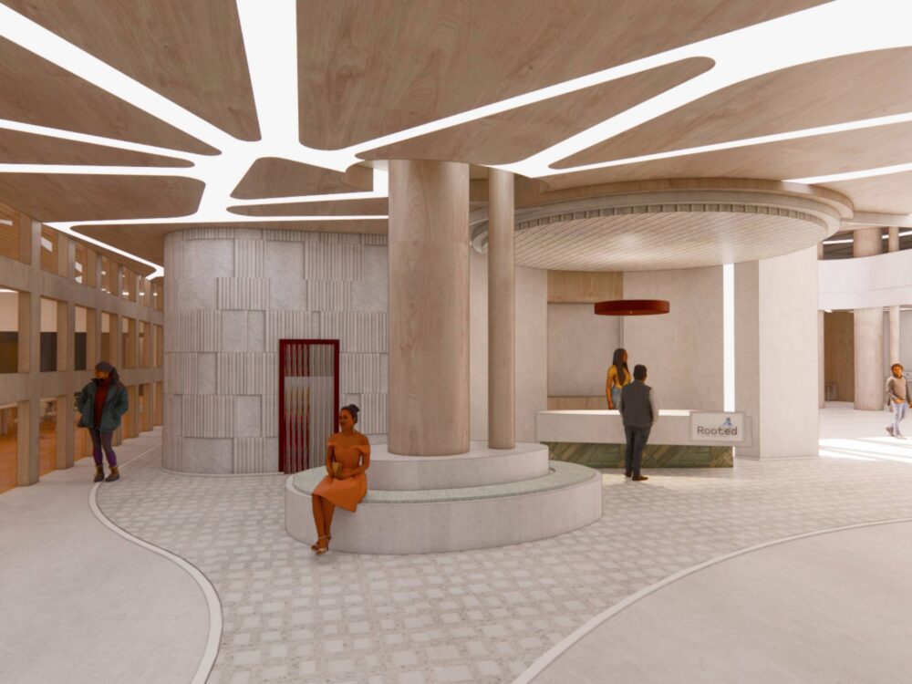 Rendering of a contemporary lobby with sculptural ceiling lighting, curved stone seating, tall columns, and a reception desk set within a neutral-toned architectural space.