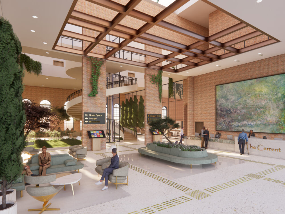 Sunlit brick‑accented atrium with large artwork, indoor greenery, curved balcony stairs, and multiple seating areas arranged beneath a grid skylight.