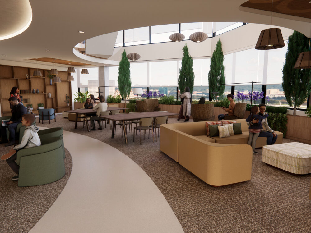 A curved, light‑filled lounge with floor‑to‑ceiling windows, tall planters, mixed seating, and people relaxing and socializing throughout the space.