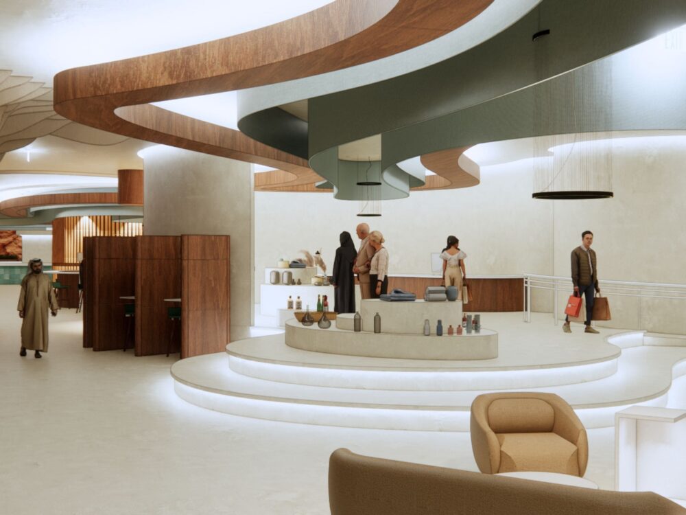 A modern retail or gallery space with sweeping ceiling curves, tiered display platforms, lounge seating, and softly lit product showcases throughout the open floor.