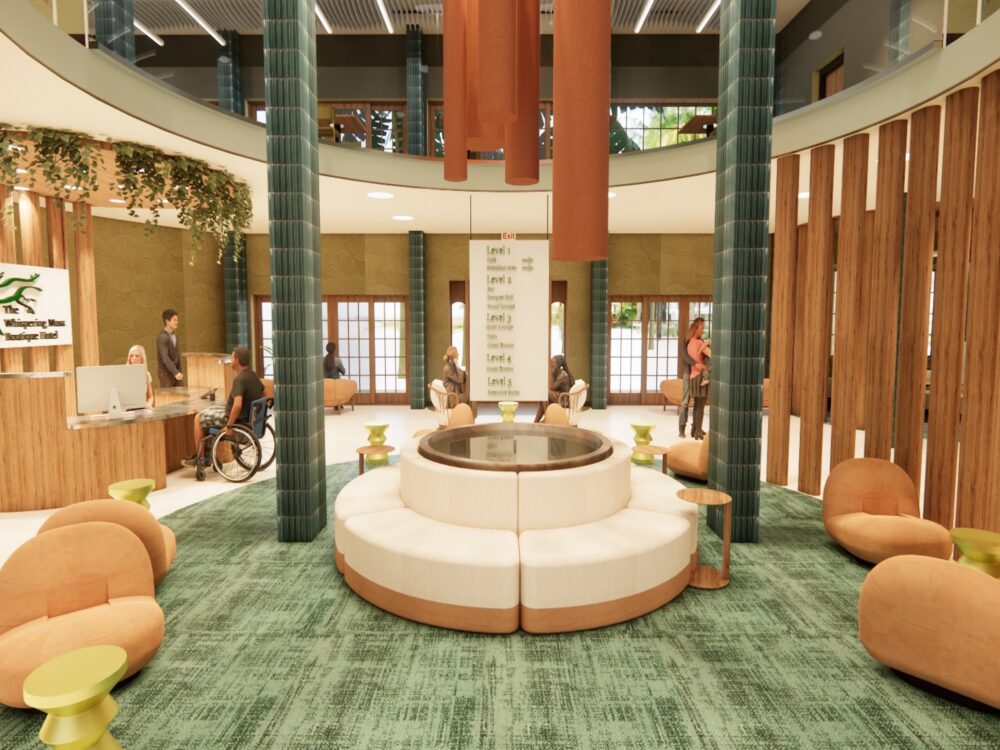 A welcoming community center lobby with green tile columns, circular lounge seating, warm wood accents, and a reception desk beneath greenery‑draped railings.