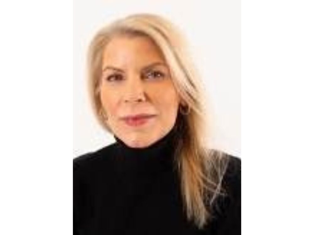 Portrait of Melissa Schirripa in front of a white background