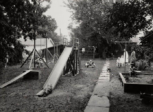 Children play outside at 212 West Laurel on July 18, 2918
