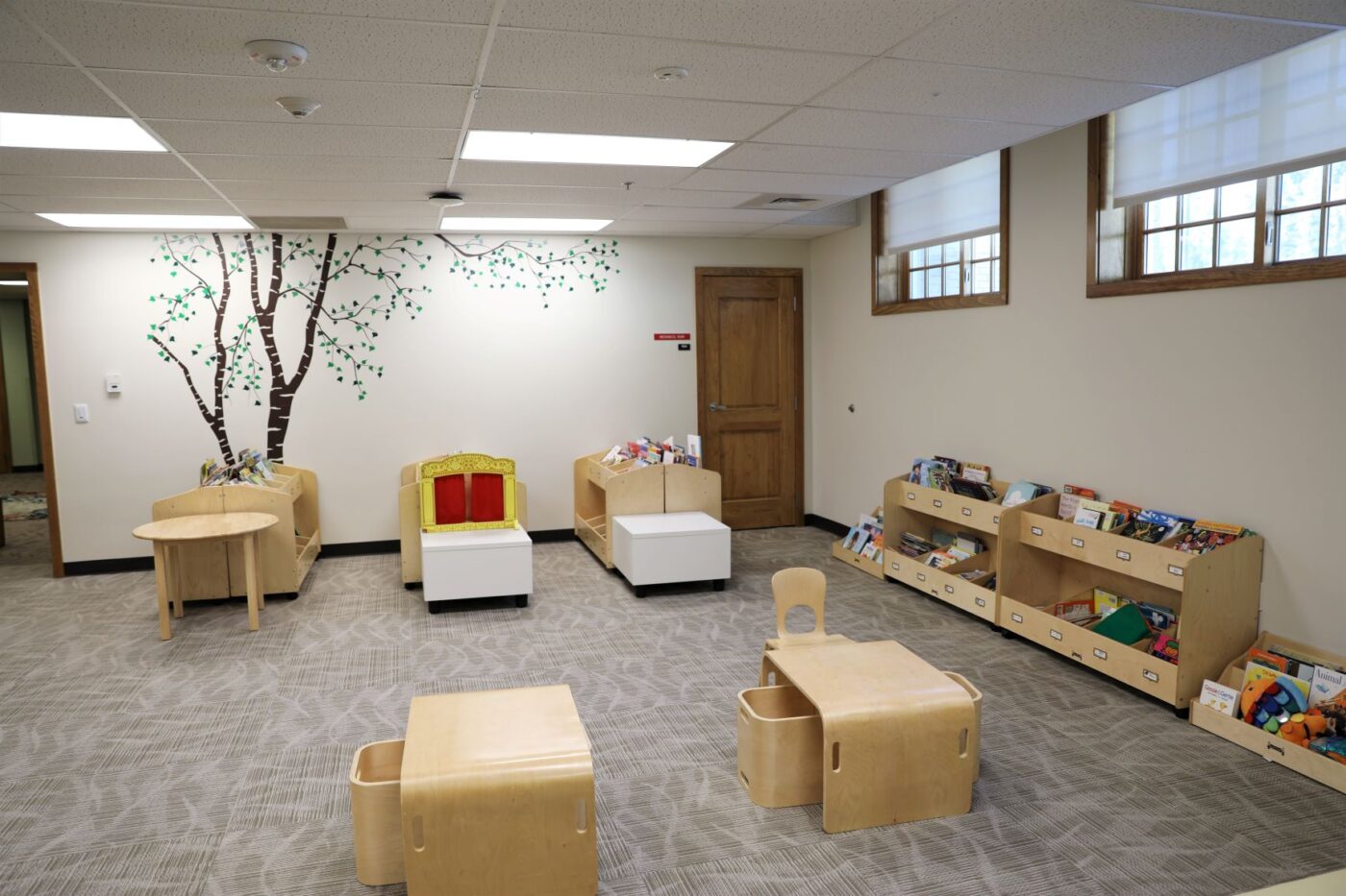 Side of bookshelves and seats in an ECC reading room