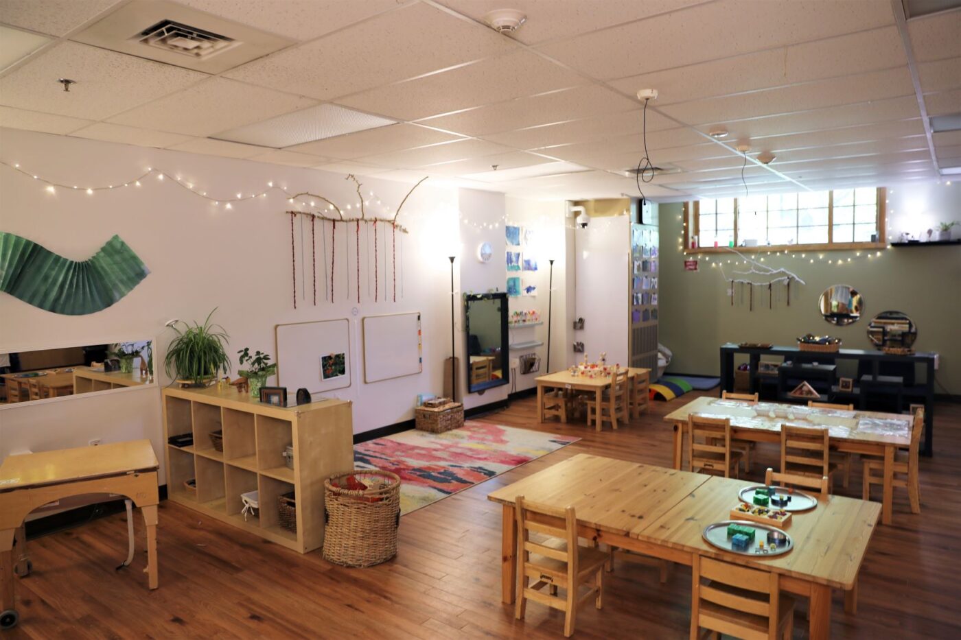 ECC lower level classroom with desks and storage