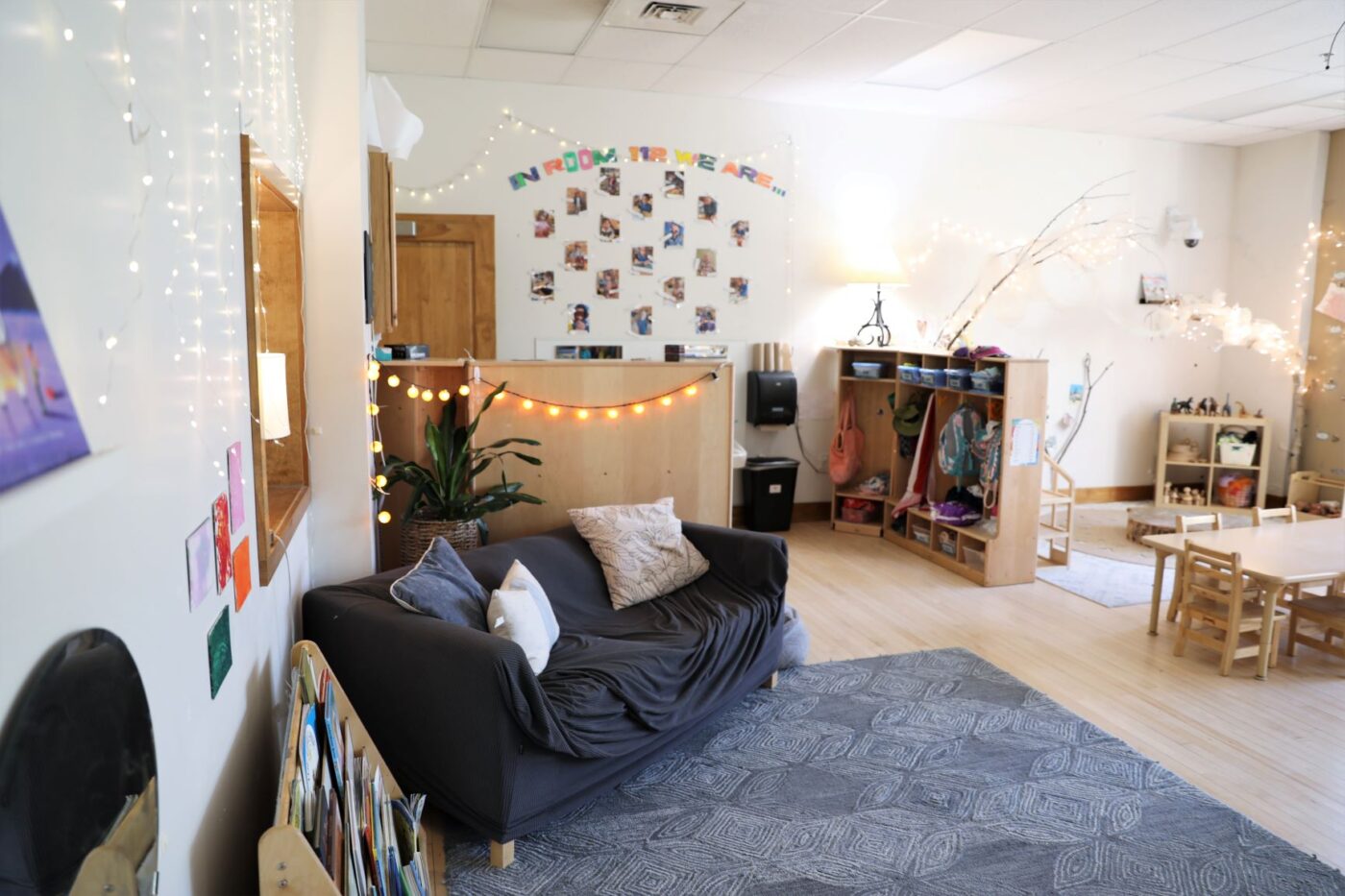 ECC room with couch, twinkle lights, shelves