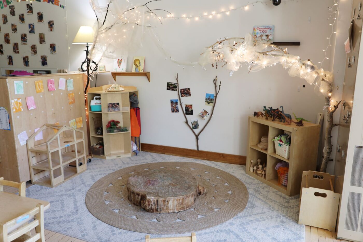 ECC room nook with tree branches and twinkle lights