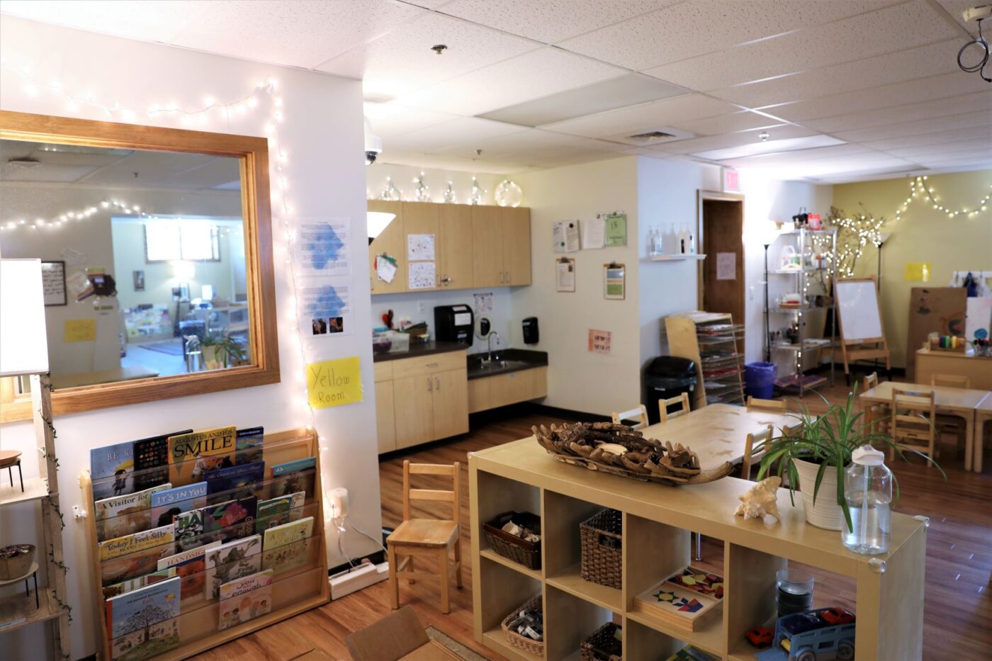 ECC lower floor room with shelves, storage, and sink space