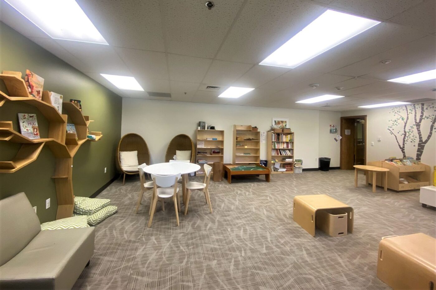 Book tree and sitting places in an ECC reading room