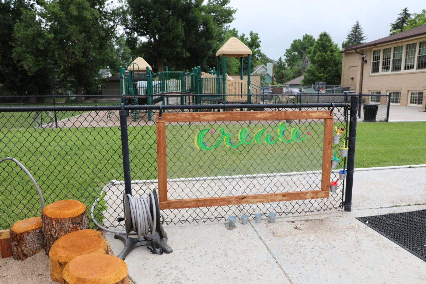 large glass painting area that says "create"