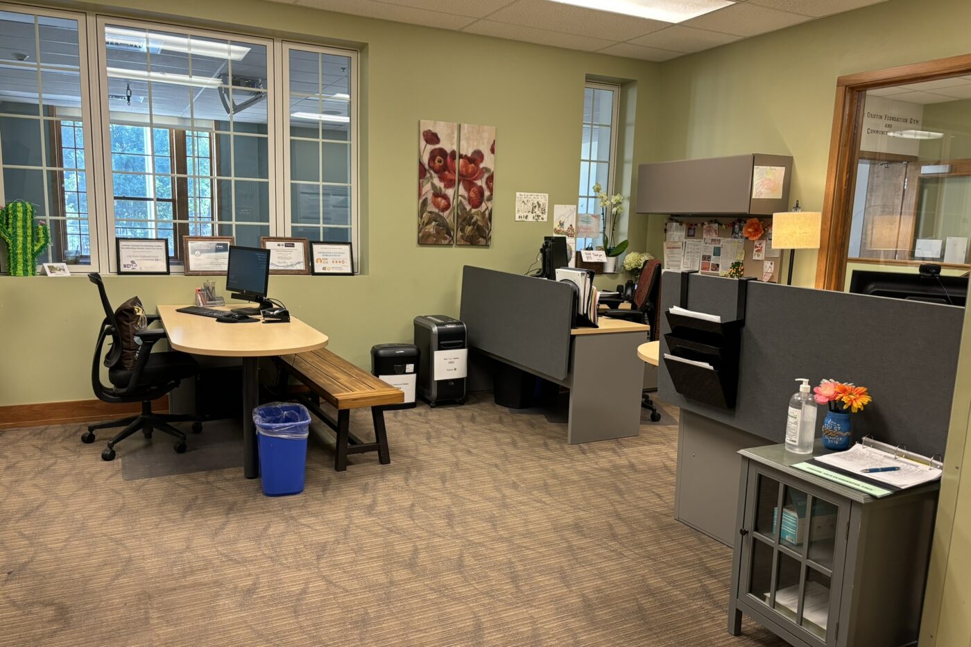 Office area with desks and computers