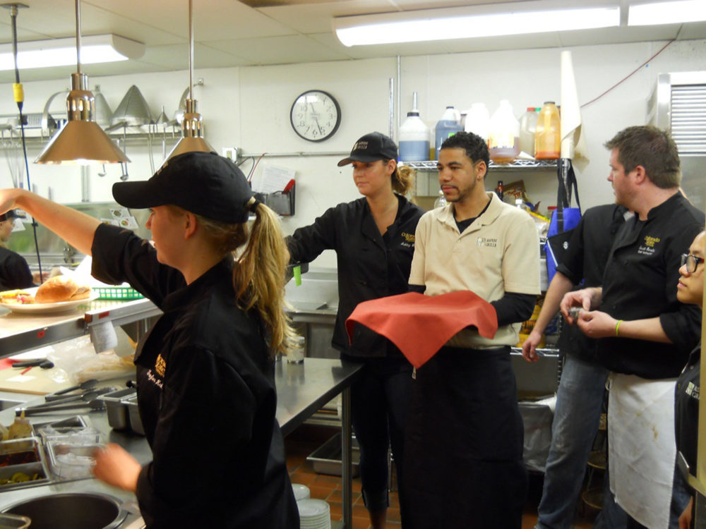 Students preparing meals at the Aspen Grille