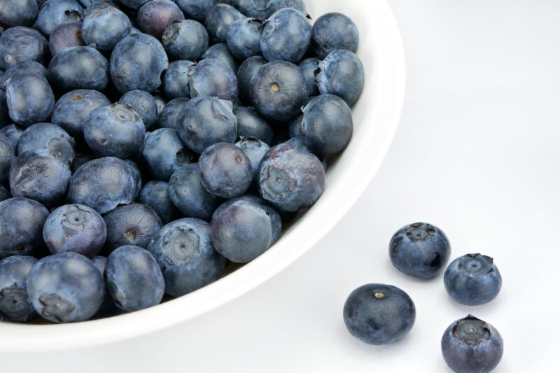 A zoomed in photo of washed blueberries