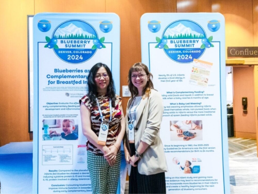 Invited speakers Dr. Minghua Tang and Kinzie Matzeller at the North American Blueberry Council Summit Meeting 2025.