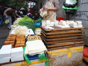 Various tofu products in a market in Haikou City, Hainan Province, China. (Anna Frodesiak for Wikimedia Commons)