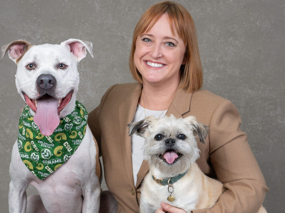 HABIC director Shelby McDonald with two dogs