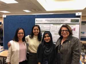 Presentation at a graduate student conference: Left to right (Dr. Patel, Dr. Lodha, Tasnuva Alam, and President McConnell)