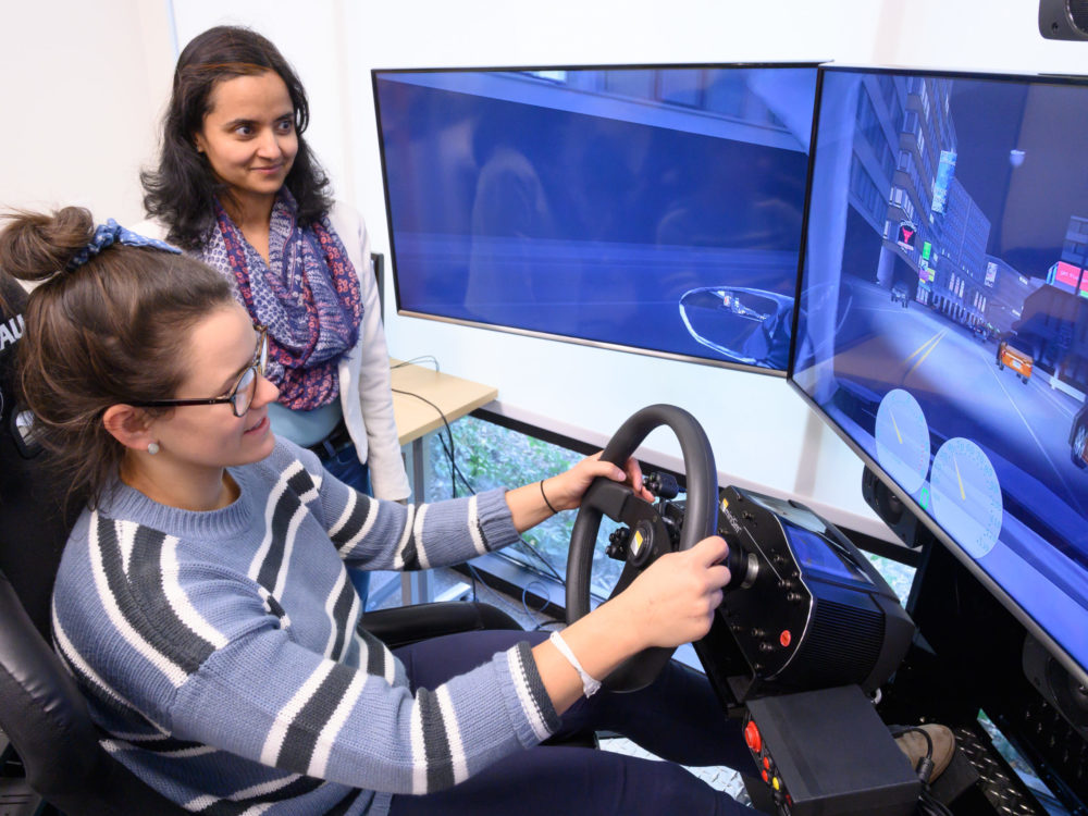 Participant using driving simulator