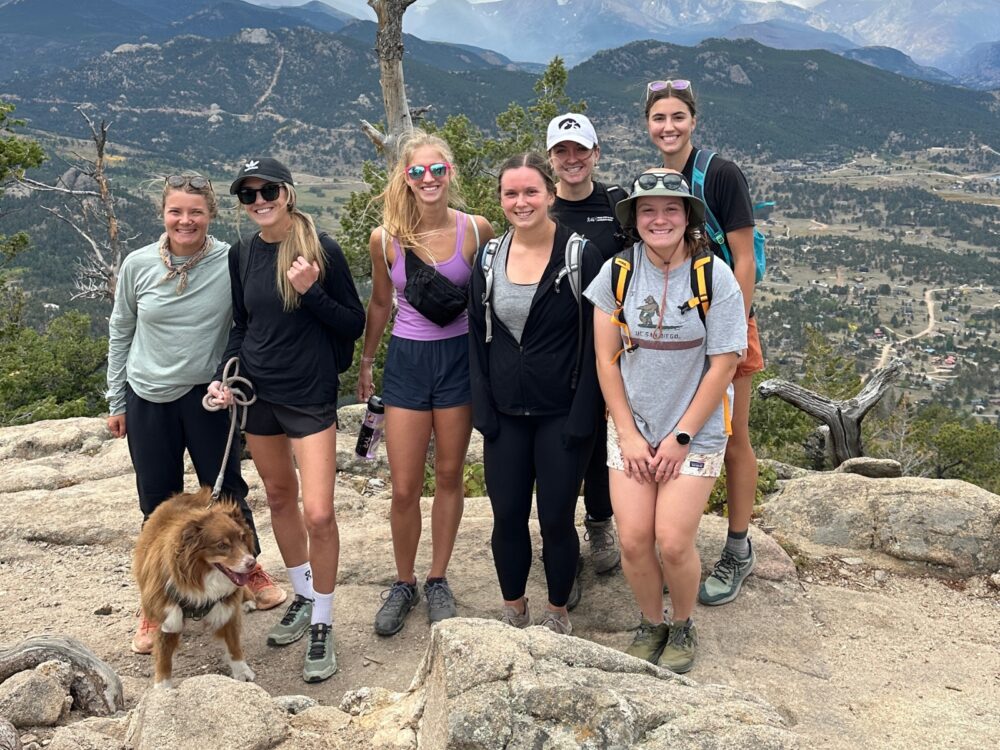 A group of PATP Lab members smile while on a hike.