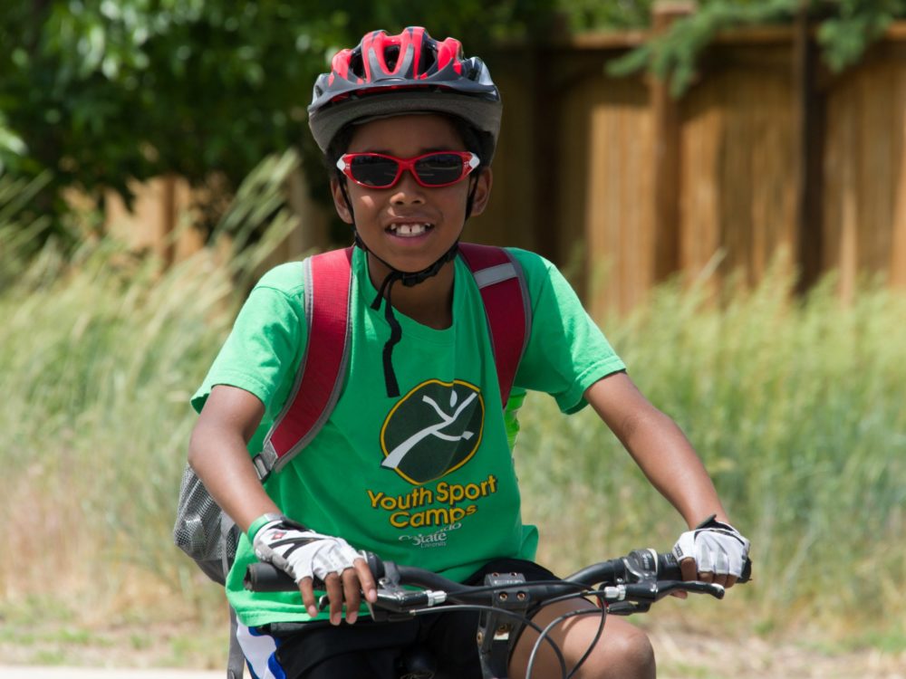 Boy riding a bike in Youth Sport Camps