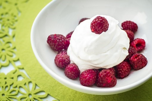 whipped coconut cream with raspberries