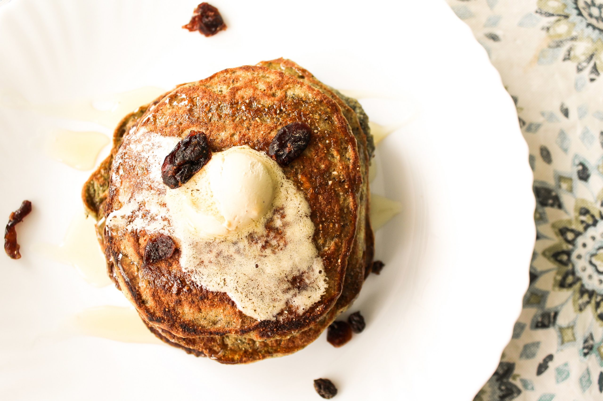 Blue corn pancakes with raisins and butter