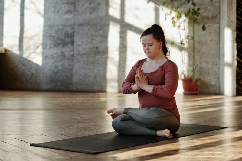Woman seated in yoga pose