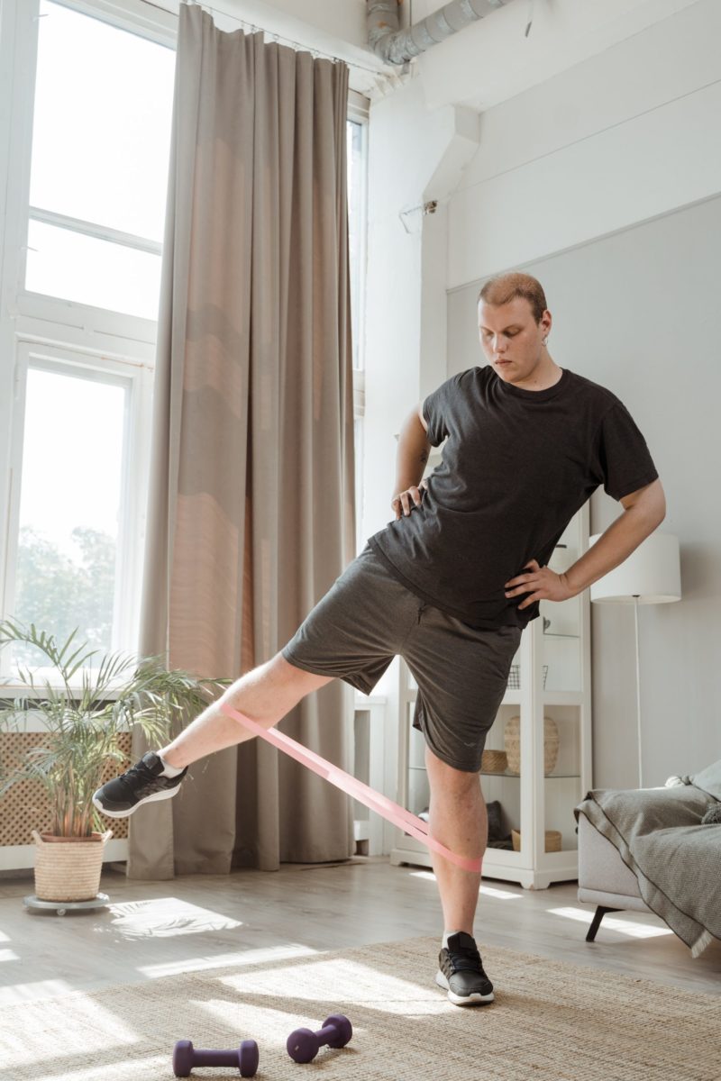 Man doing exercise in home