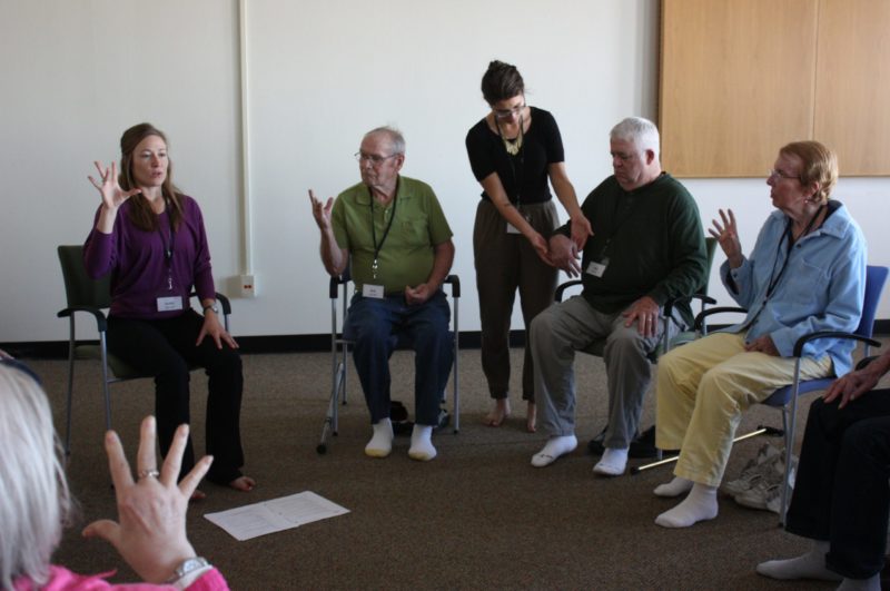Arlene Schmidt teaching yoga class