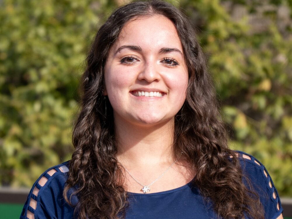 Portrait of Celine Cicneros outside of the occupational therapy building.