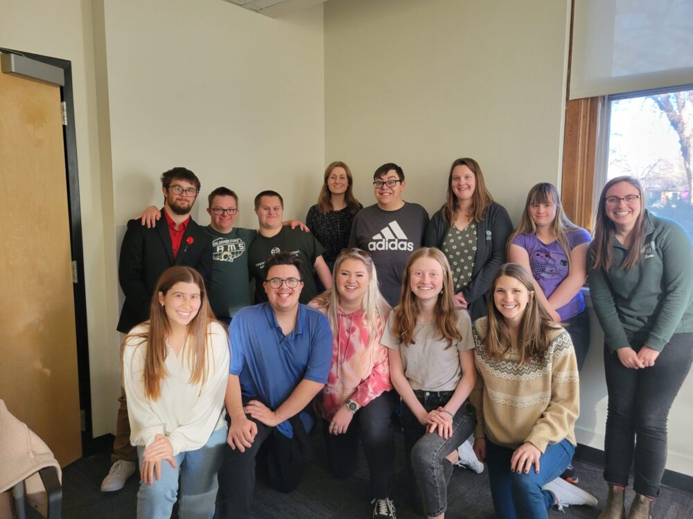 A group of RAM Scholars participants at Colorado State University smile in a classroom.