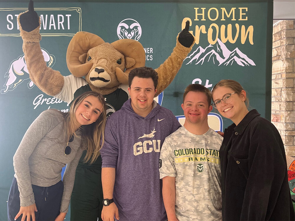 Ram Scholars participants and mentors pose for photo with Cam the Ram mascot