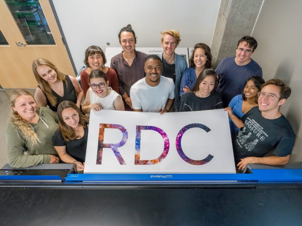 RDC students using the vinyl printer