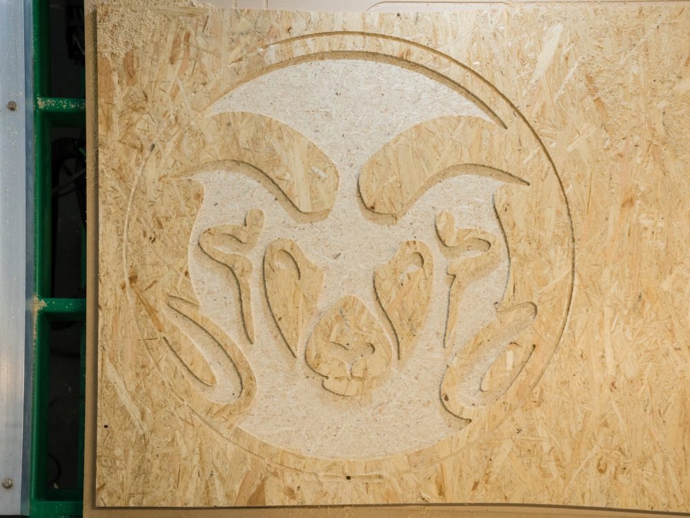 A wooden Rams head that made with the CNC router in the Wood Lab