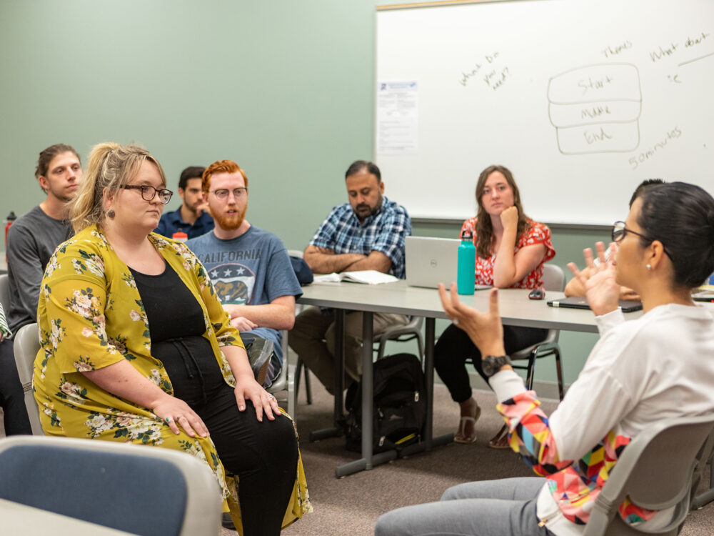 Students practice counseling with Dr. Jessica Gonzalez-Voller (right)