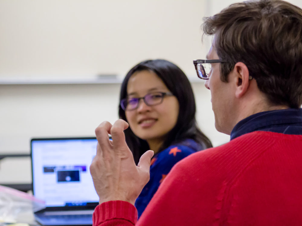 student in a discussion in classroom