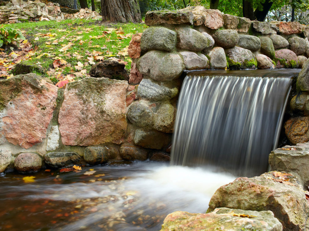 waterfall cascading over stones