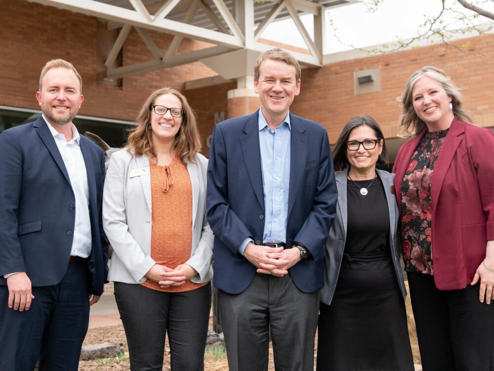 Senator Bennet with Amy Martonis, CSU MSW Program Director, and other leaders and collaborators on the grant from PSD.